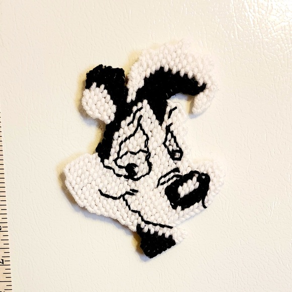 Other - Refrigerator magnet of Pepe Le Pew.  Made of plastic canvas and yarn.